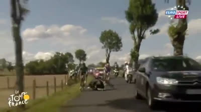 WTF! Car causes crash in the Tour de France