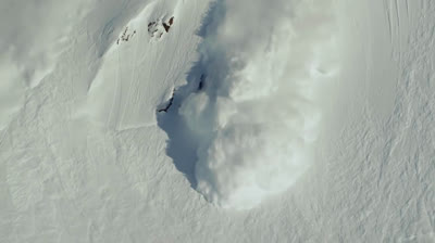 Travis Rice survives to an avalanche